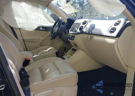 2011 Volkswagen Tiguan Sel z USA, uszkodzony, nr VIN WVGBV7AX7BW557398